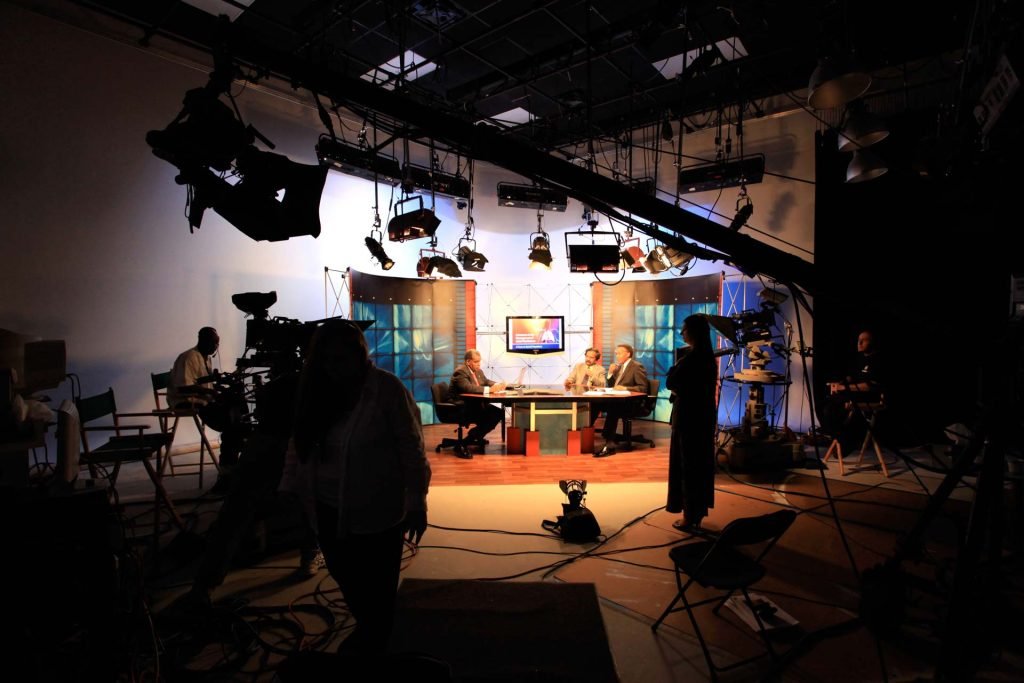 Behind the scenes television studio production Seattle hair and makeup artist