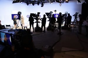 Behind the scenes television studio production Seattle hair and makeup artist